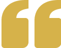 Gold quotation mark on black background.
